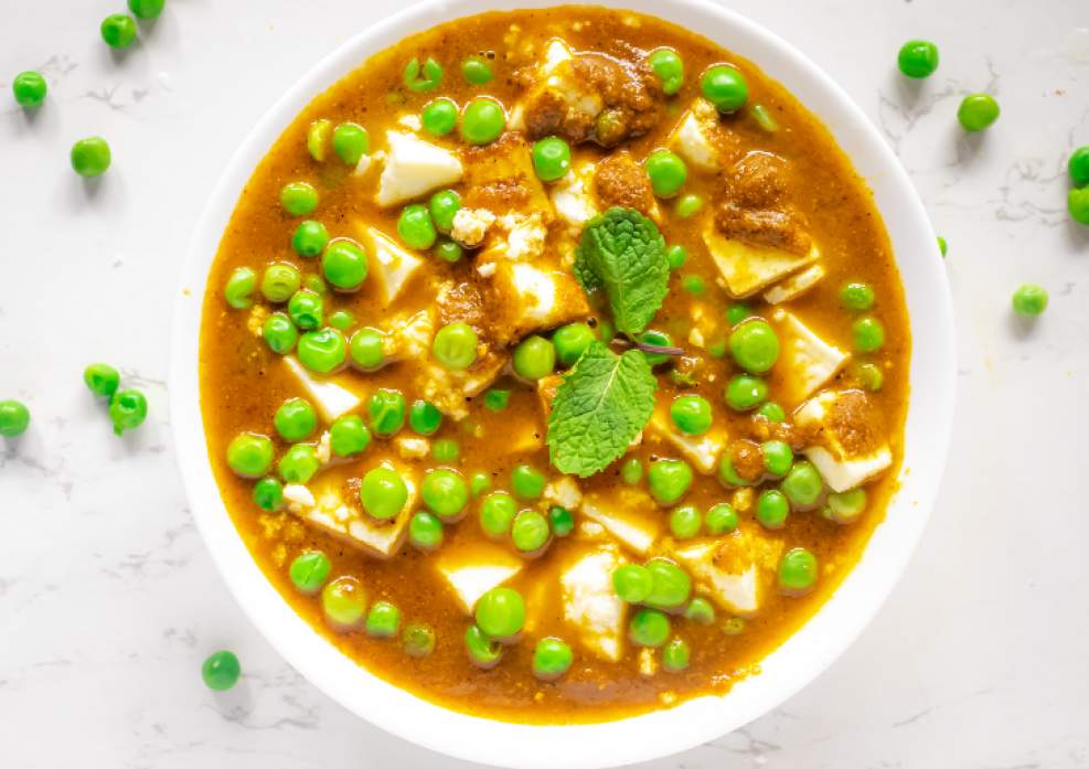 A bowl of Matar Paneer