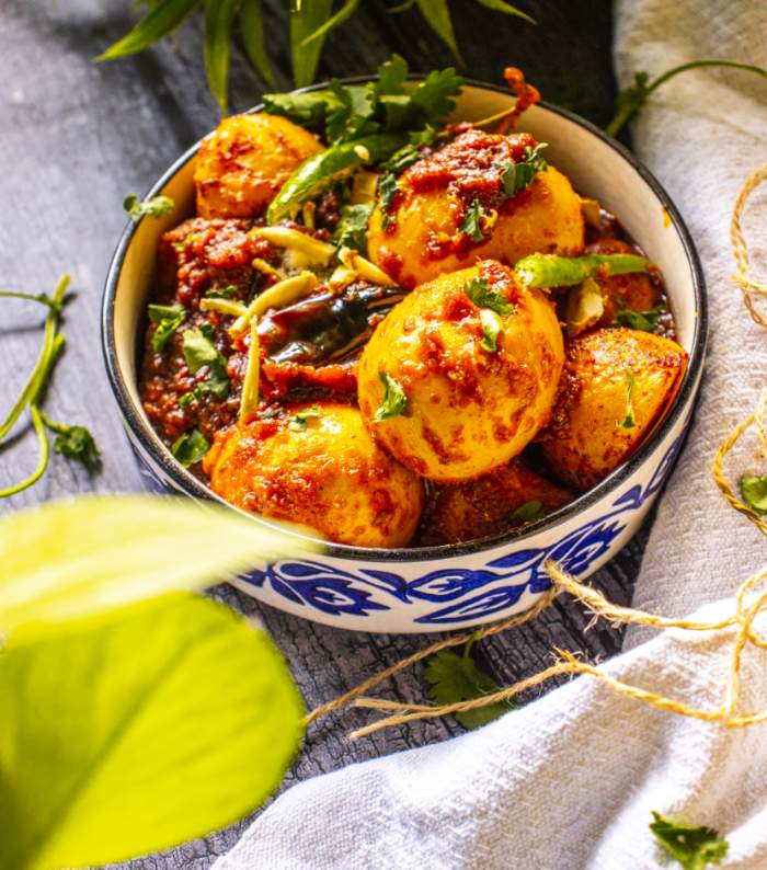 Egg Masala Dhaba Style on plate with coriander leaves