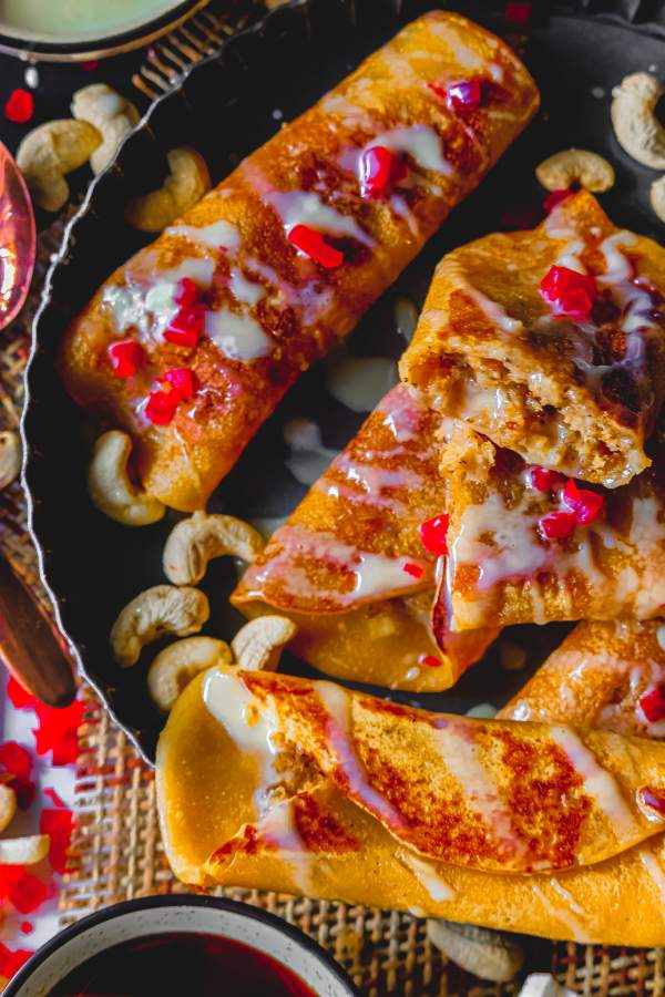 Gurer Patishapta with Coconut Filling on a plate 