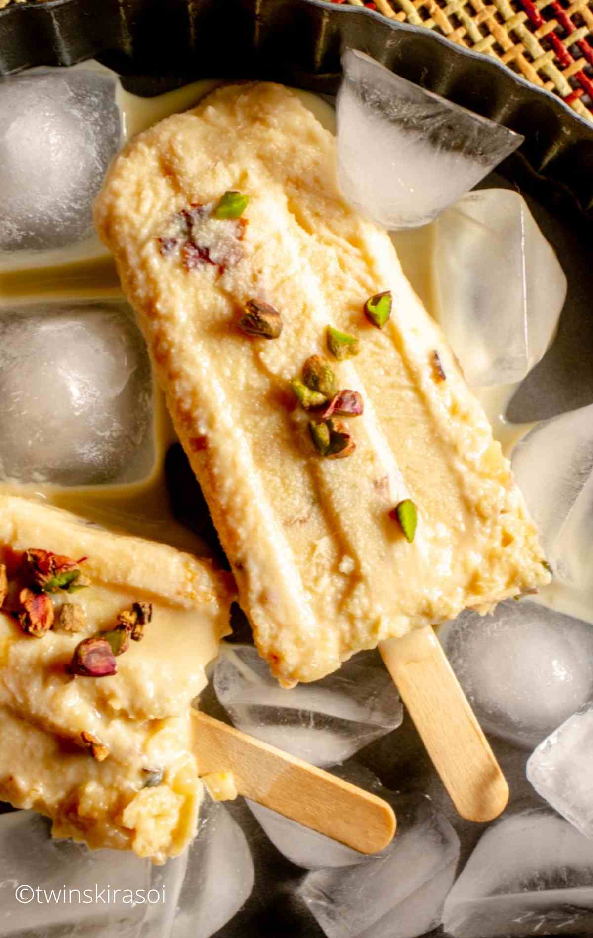 Malai Kulfi Recipe with Kesar Pista on ice cubes